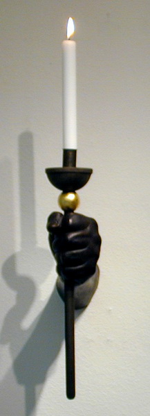 Hand mit Leuchter